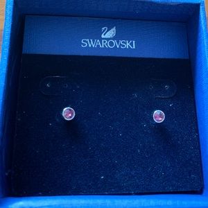 SWAROVSKI purple solitaire earrings